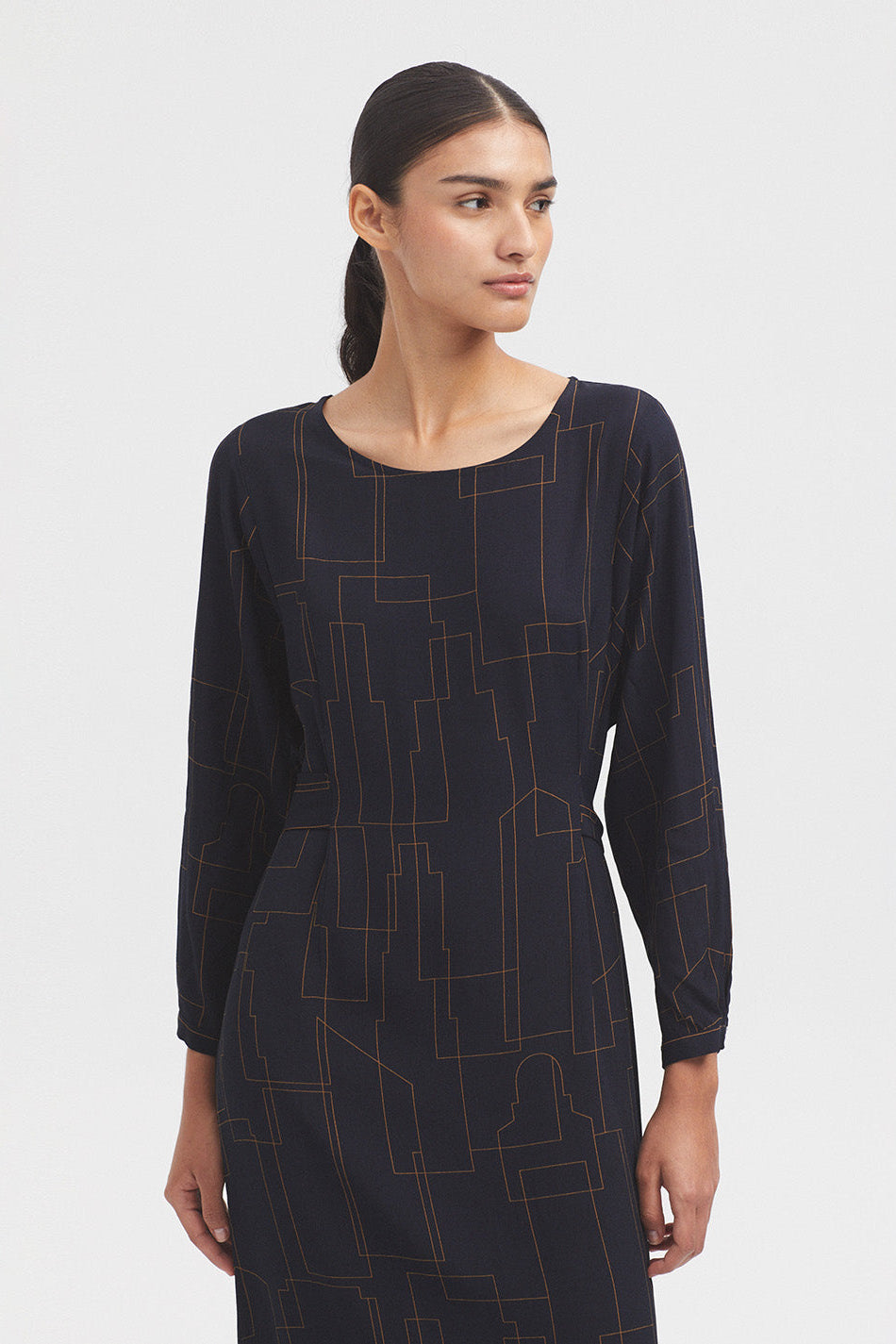 Long Sleeve Navy dress with all over print and waist tie. 