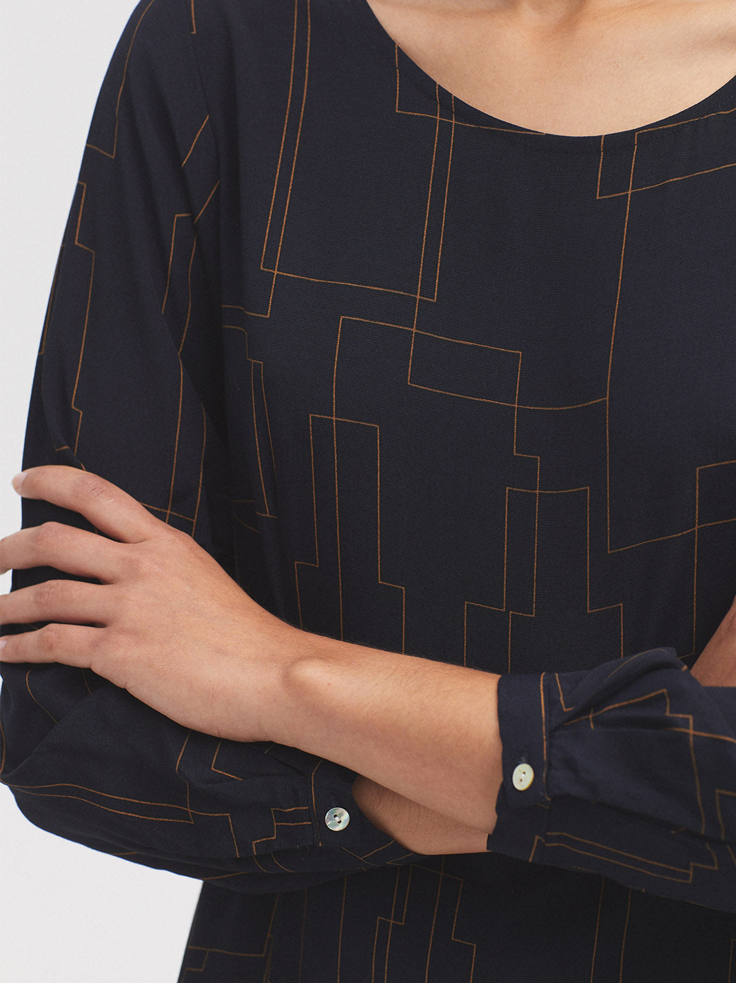 Long Sleeve Navy dress with all over print and waist tie. 