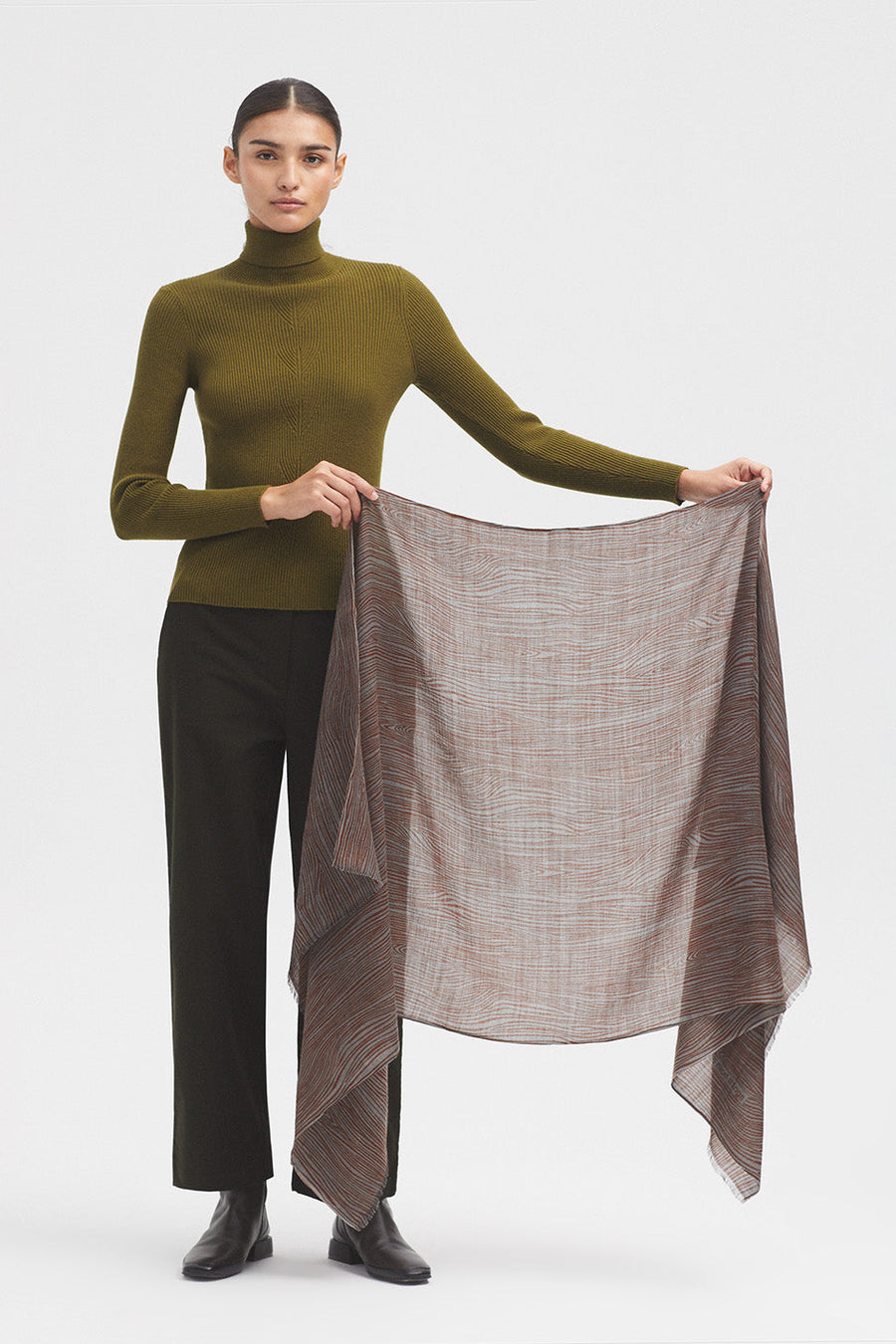Scarf with grey base and all over terracotta pattern. 