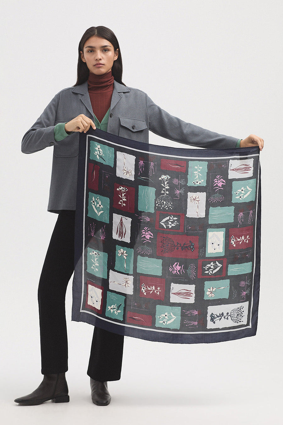 Colourful square silk scarf with all over print.  