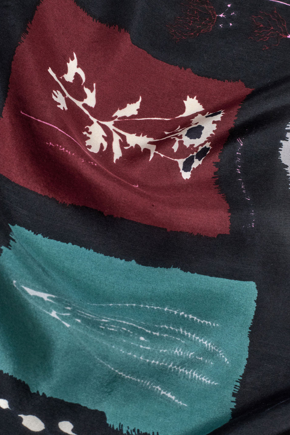 Colorful silk scarf with allover floral print. 