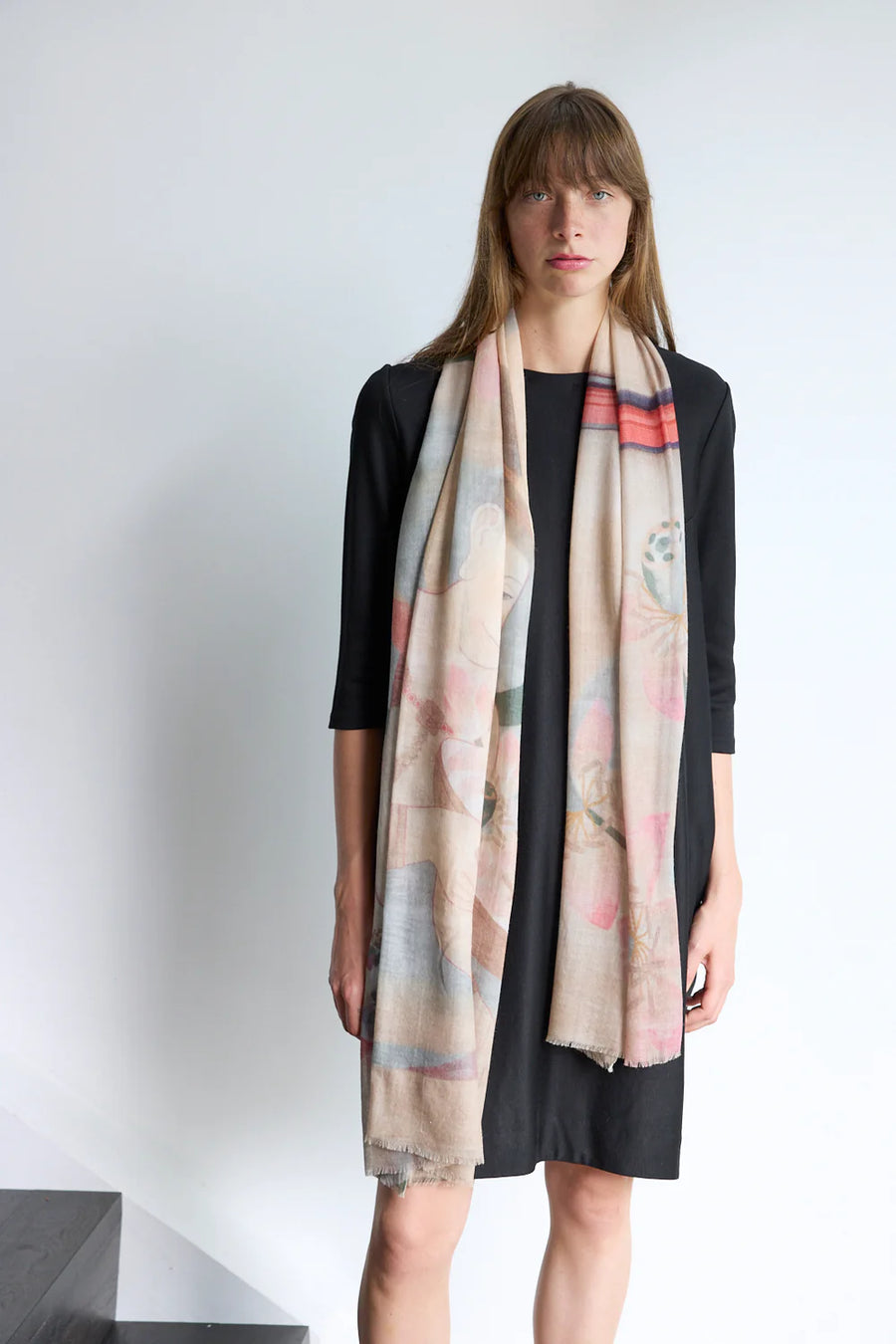 Colourful wool scarf in pink and purple tones with pattern 