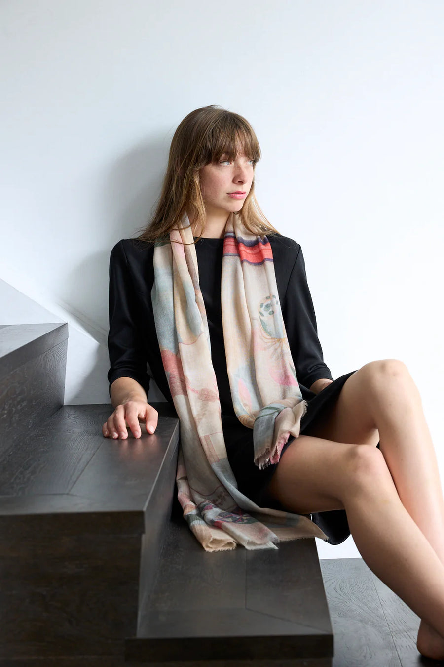 Colourful wool scarf in pink and purple tones with pattern 
