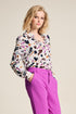 Floral Print blouse with white base, long sleeve and collar. Floral print in fushia, black and tan colours. 