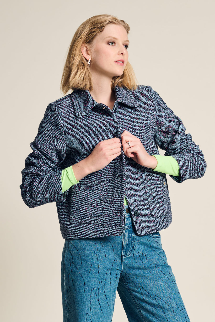 Blue Tweed Jacket with long sleeves and shirt collar. 