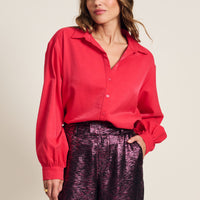 Vibrant Pink long sleeve shirt with slight shimmer in the fabric. 
