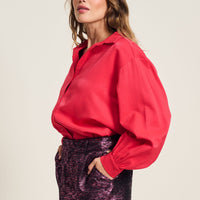 Vibrant Pink long sleeve shirt with slight shimmer in the fabric. 