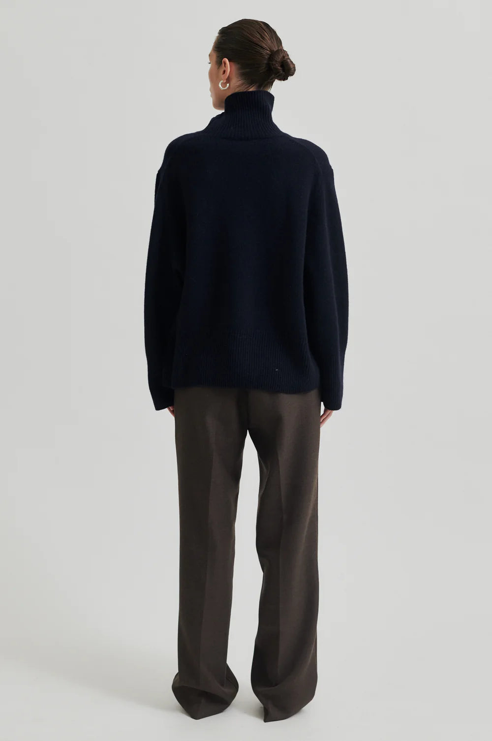 Wool turtle neck sweater in thick rib fabric in night sky (deep navy). Wide fit. 