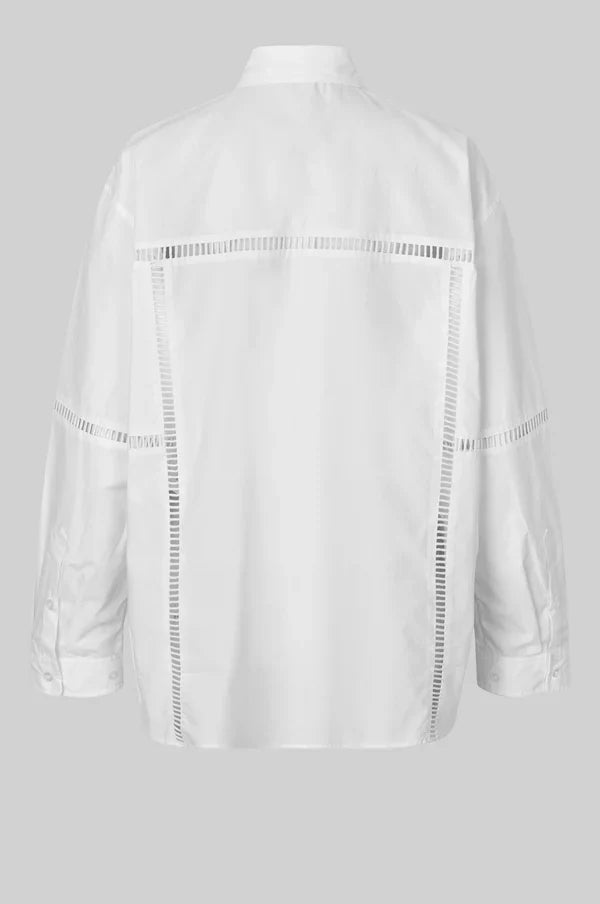 White long sleeve collared shirt with ladder lace detail. 