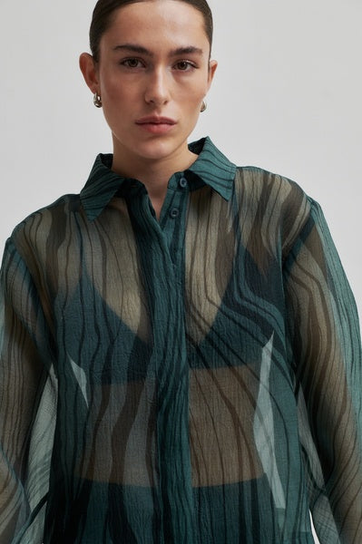 Forest Green Long Sleeve Sheer Shirt with subtle print. 