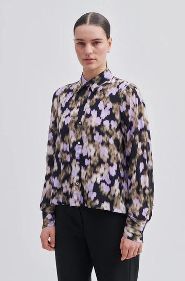 Patterned shirt purple and kakhi on black base.  Semi Sheer viscose with all over blurry print. Shaped sleeves and buttoned cuffs. 