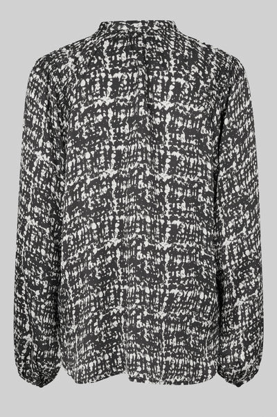 Long Sleeve shirt with round neckline and all over monochrome print. 
