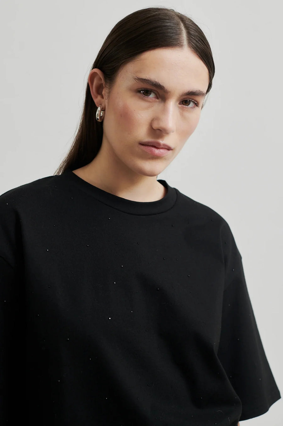 Round Neck Tee with elbow length sleeve and glitter detail throughout.