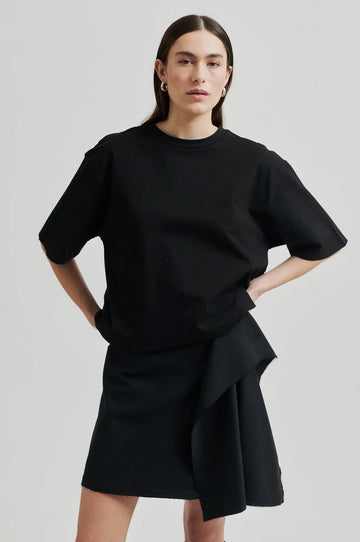 Round Neck Tee with elbow length sleeve and glitter detail throughout.