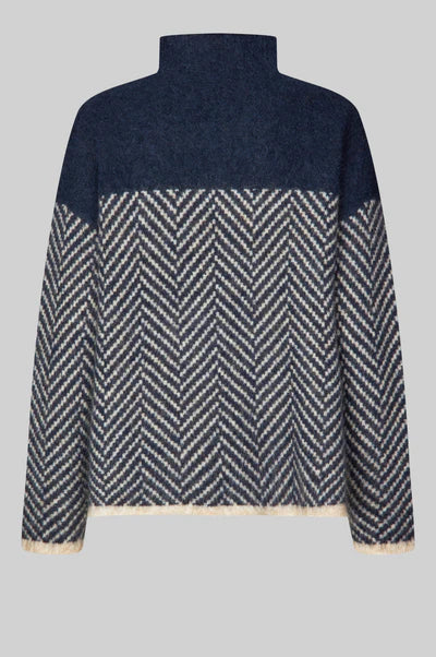 Chevron patterned turtle-neck pullover in Navy and Cream.