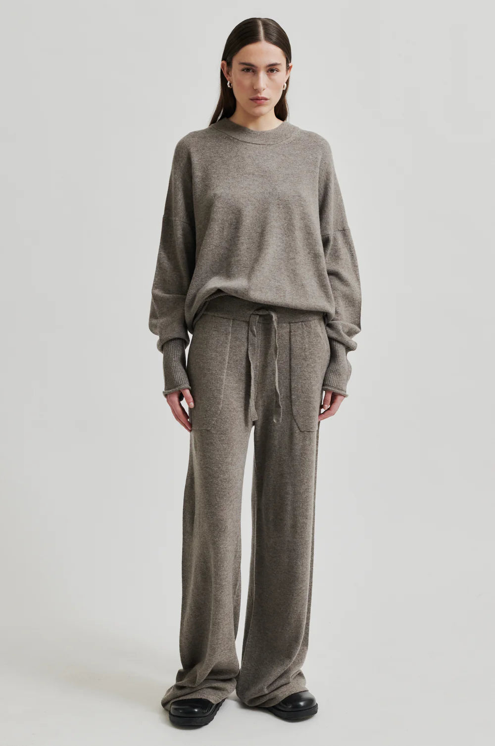 Round Neck Soft Cashmere Wool Blend Knit. Ribbed hem, cuff and neckline in a walnut colour. 