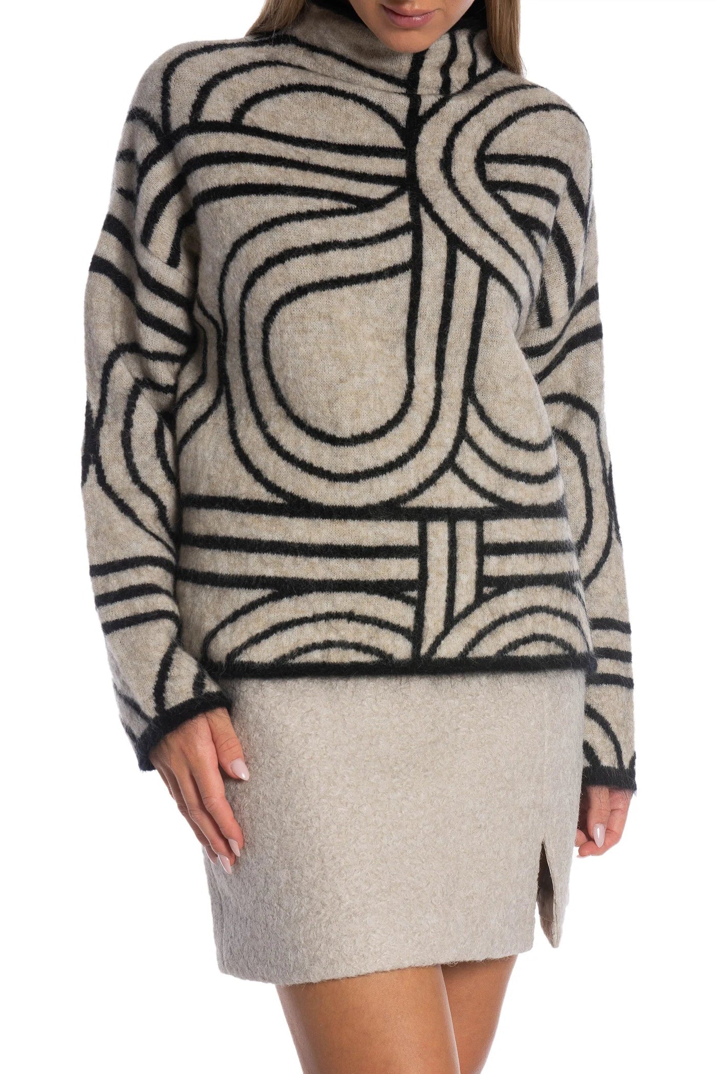 Person wearing a patterned sweater and skirt on a white background