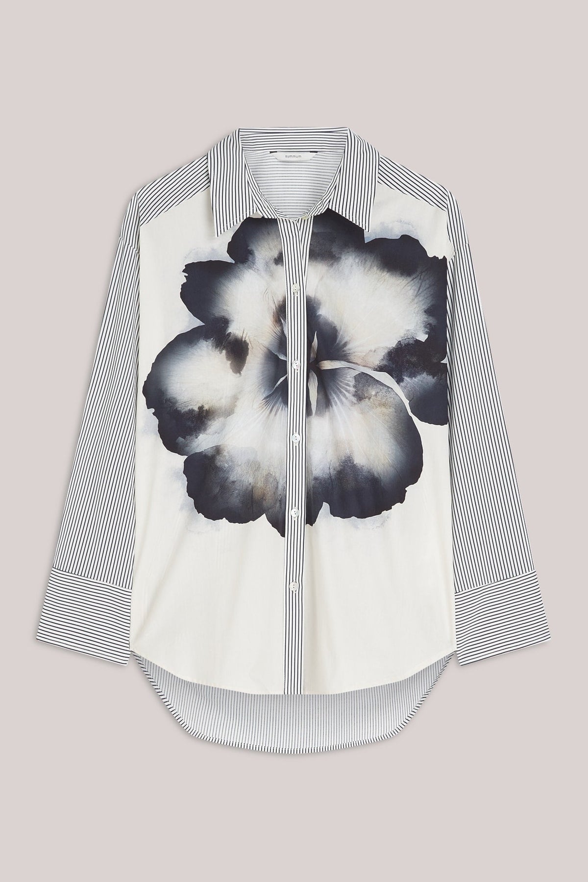 Floral patterned shirt with a striped collar  sleeves and back on a light  background