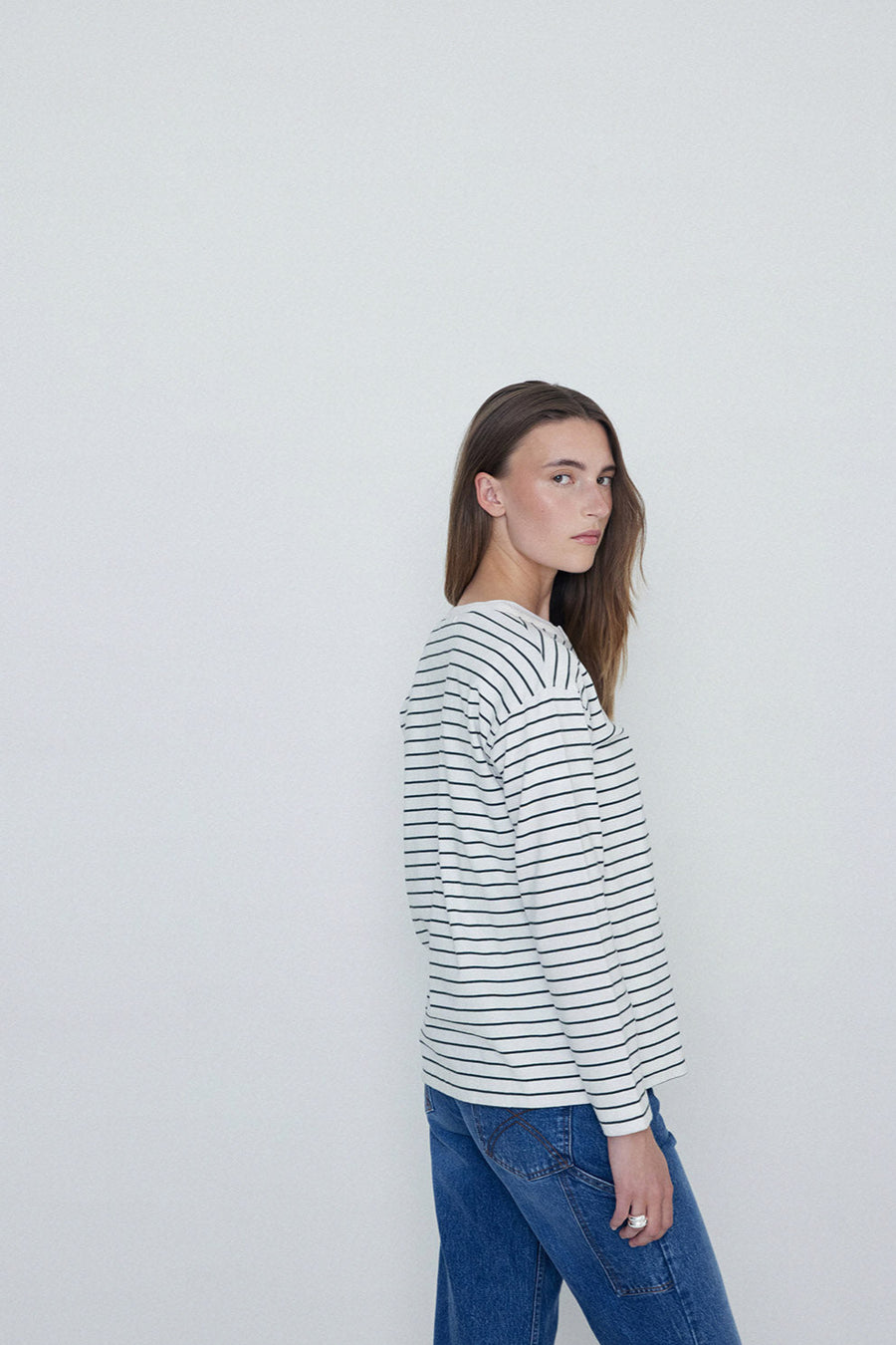 khaki and white stripe long sleeve tee with button front detail. 