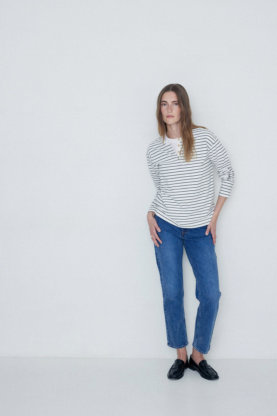 khaki and white stripe long sleeve tee with button front detail. 