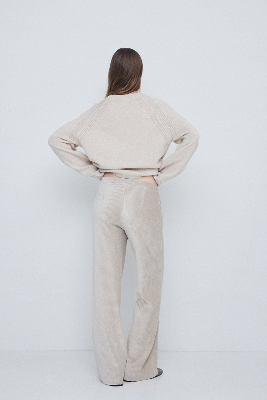 Wide Leg Corduroy Trouser in Natural with elastic waist. Back. 