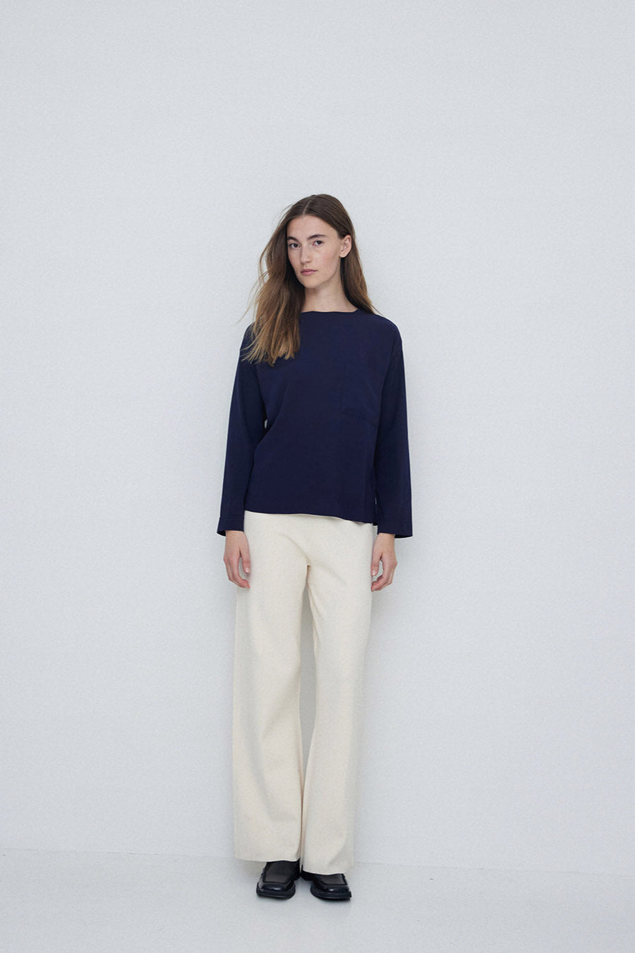 Navy round neck long sleeve tee shirt. 