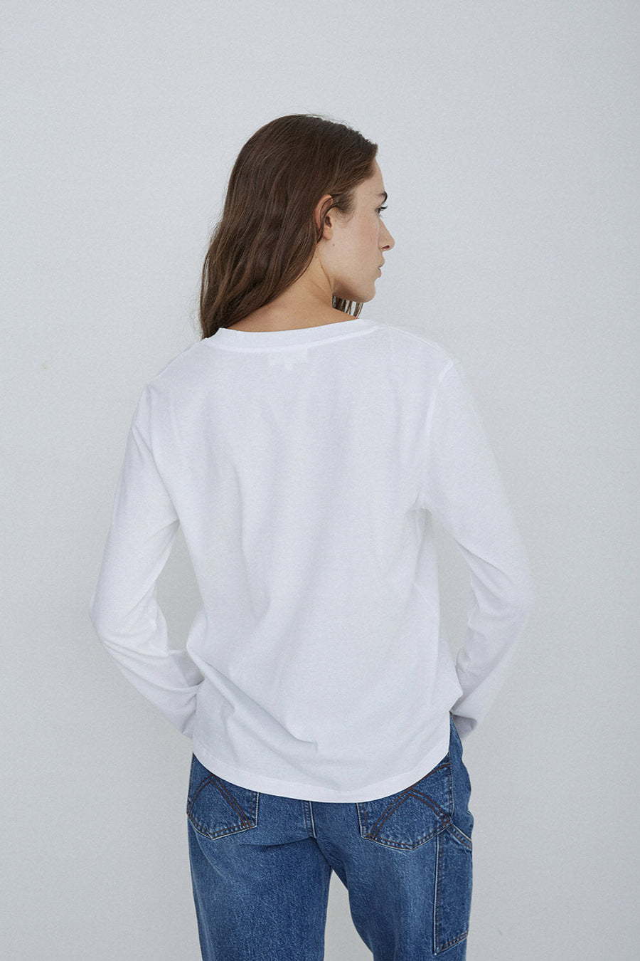 White organic cotton v neck tee with long sleeves. 