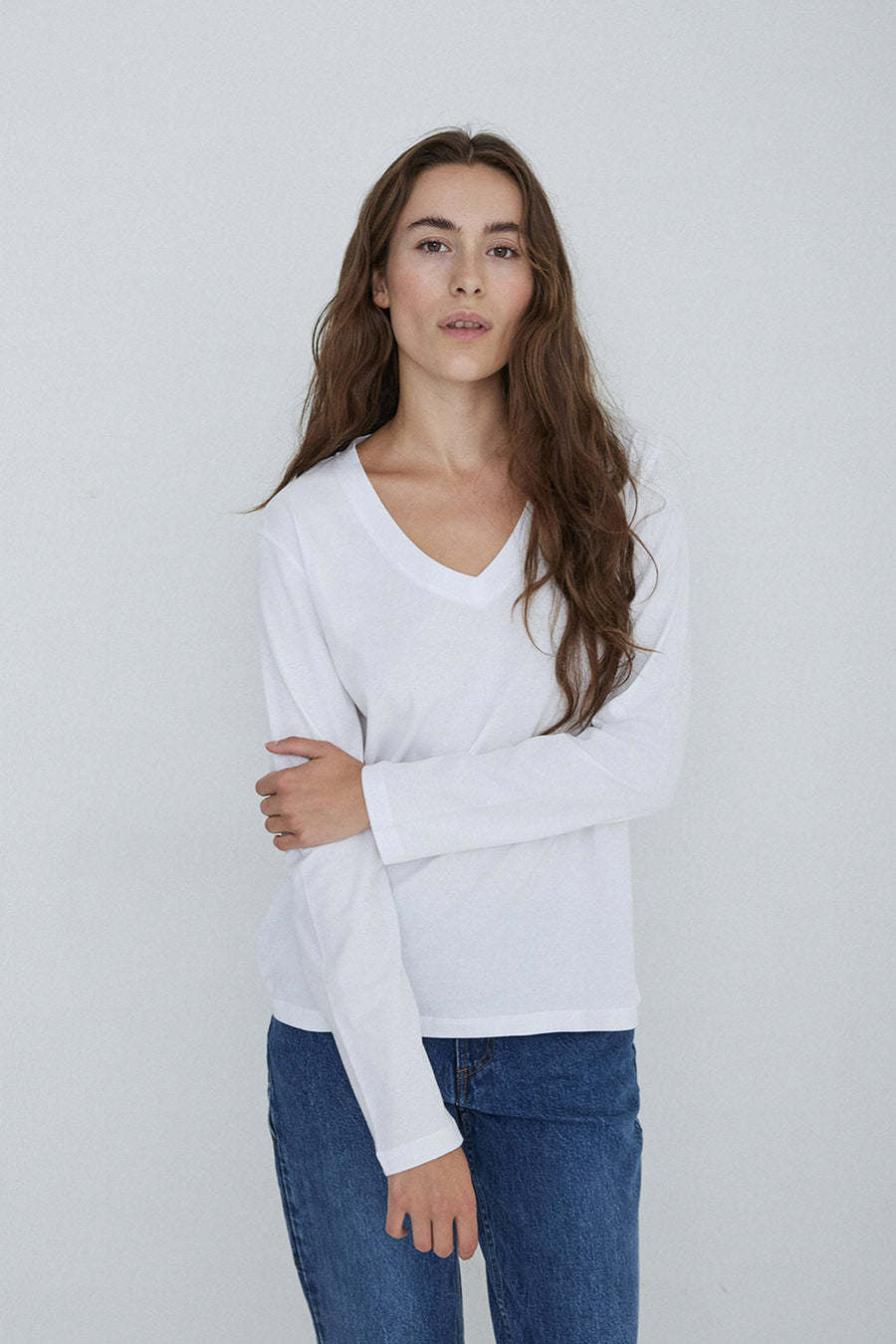 White organic cotton v neck tee with long sleeves. 