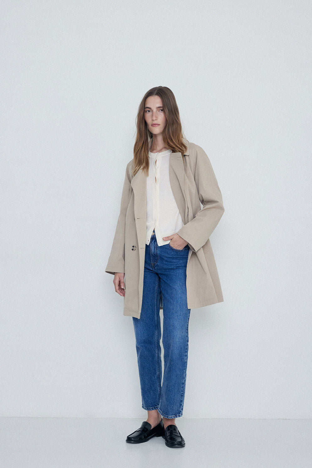 Sand midi length double breasted trench with wide belt. 