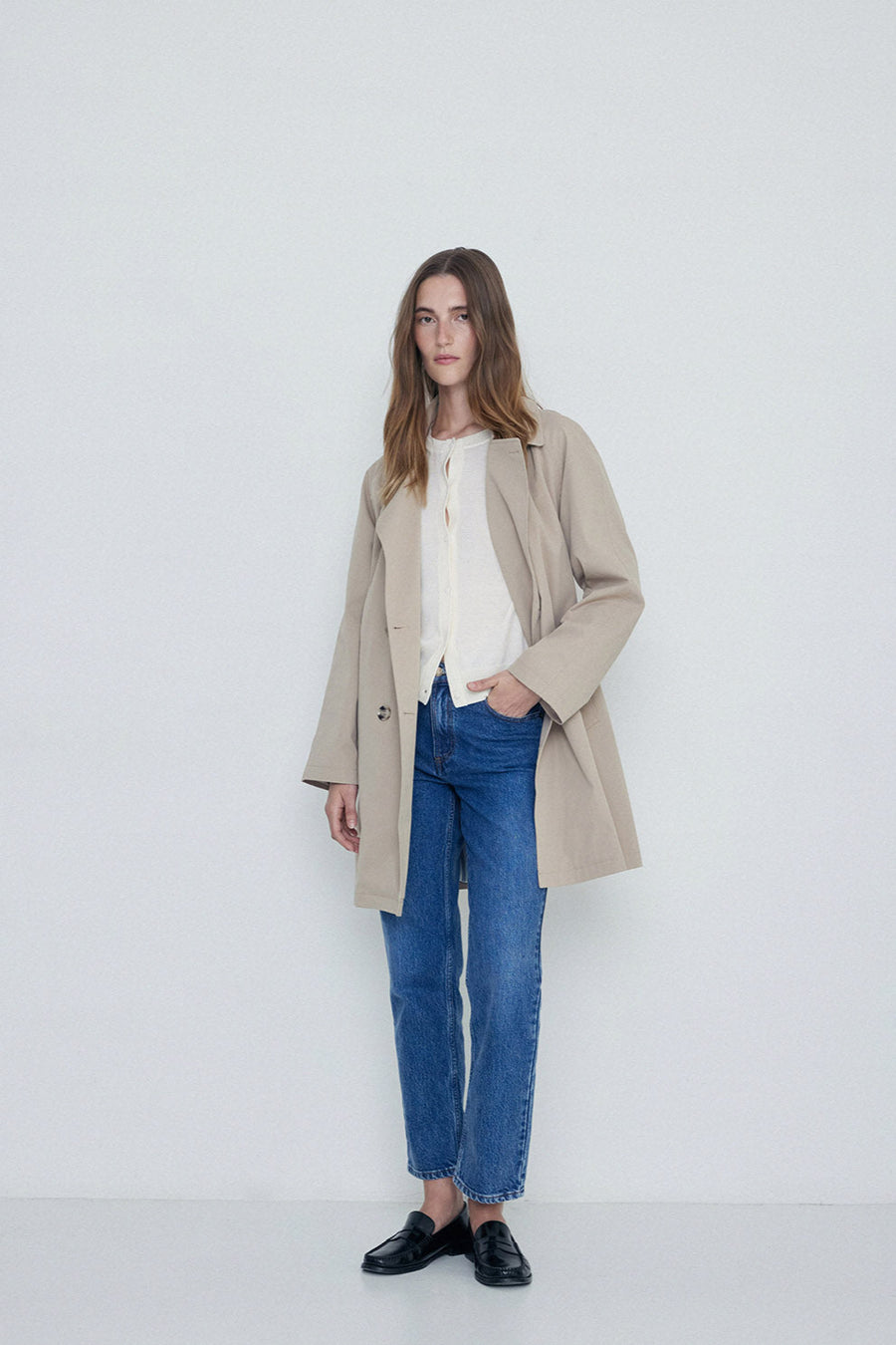 Sand midi length double breasted trench with wide belt. 