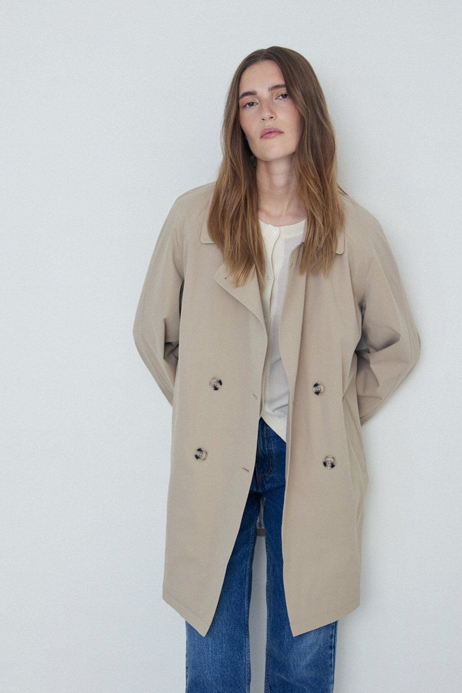 Sand midi length double breasted trench with wide belt. 