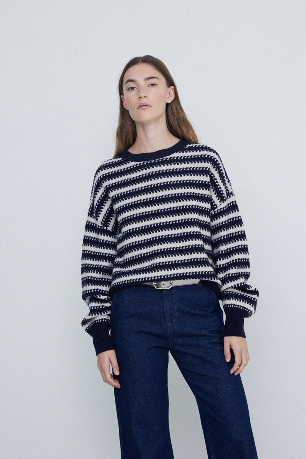 Navy and Ecru striped round neck wool sweater. 