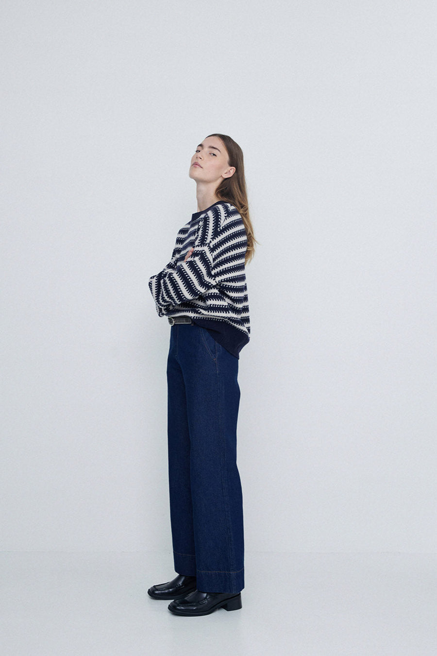 Navy and Ecru striped round neck wool sweater. 