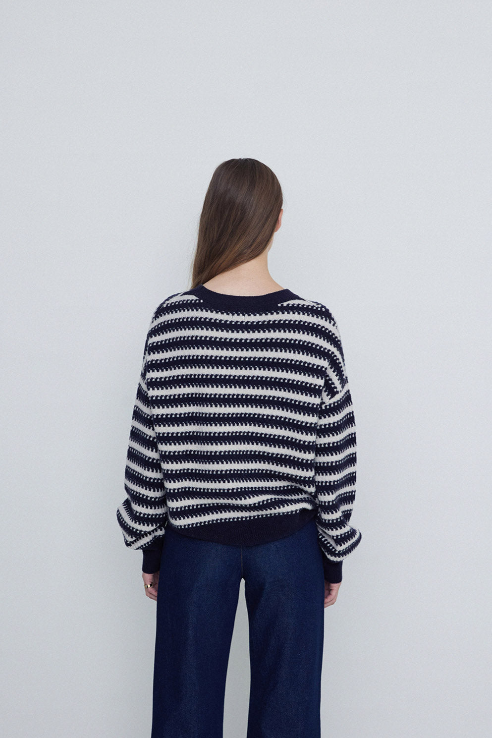 Navy and Ecru striped round neck wool sweater. 