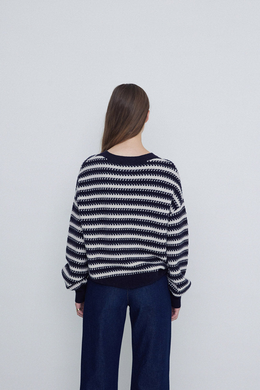 Navy and Ecru striped round neck wool sweater. 