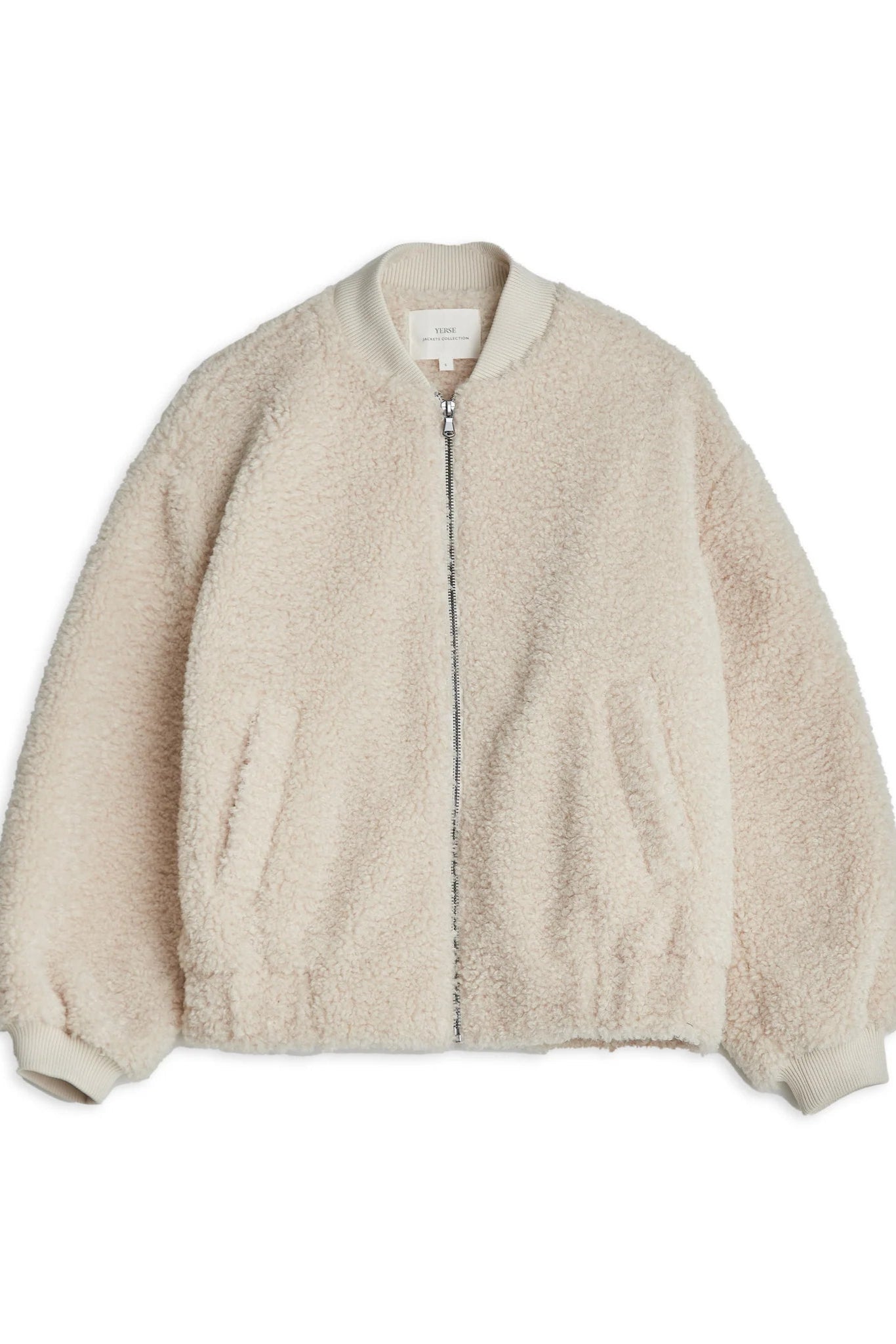 Beige sherpa jacket with cuffs. 