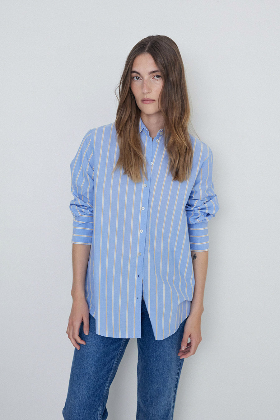 Over Size Blue and white stripe shirt.