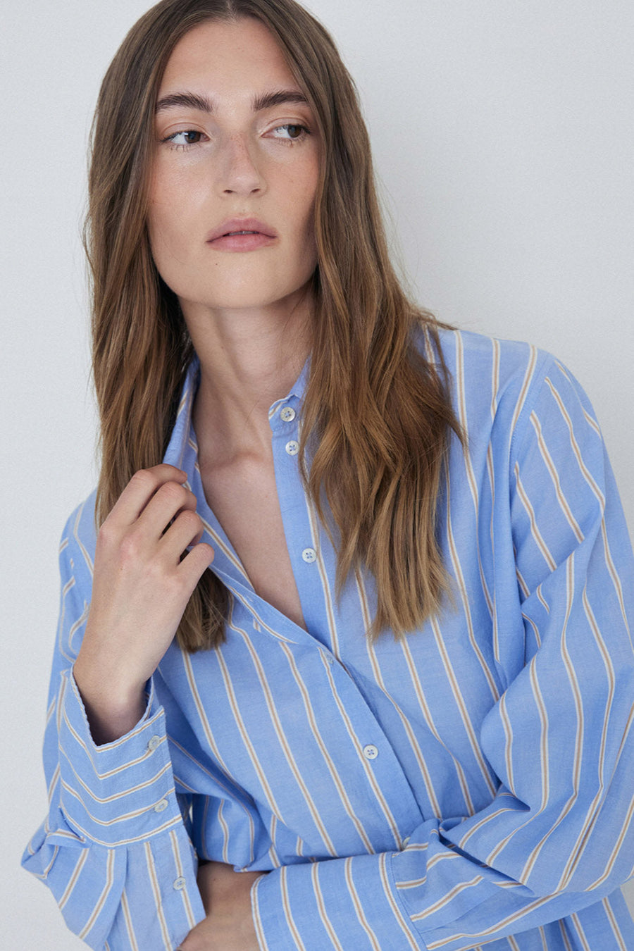 Over Size Blue and white stripe shirt.