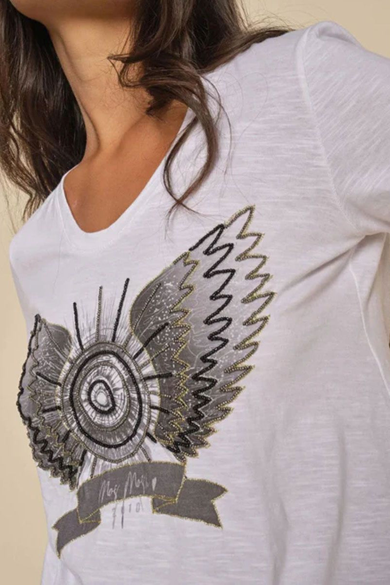 White tee shirt with gold and black motif