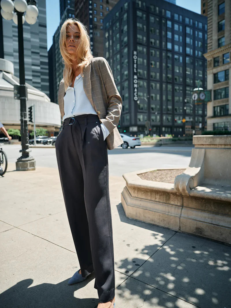 Wide leg black look trouser with front pleats and belt with silver buckle. 
