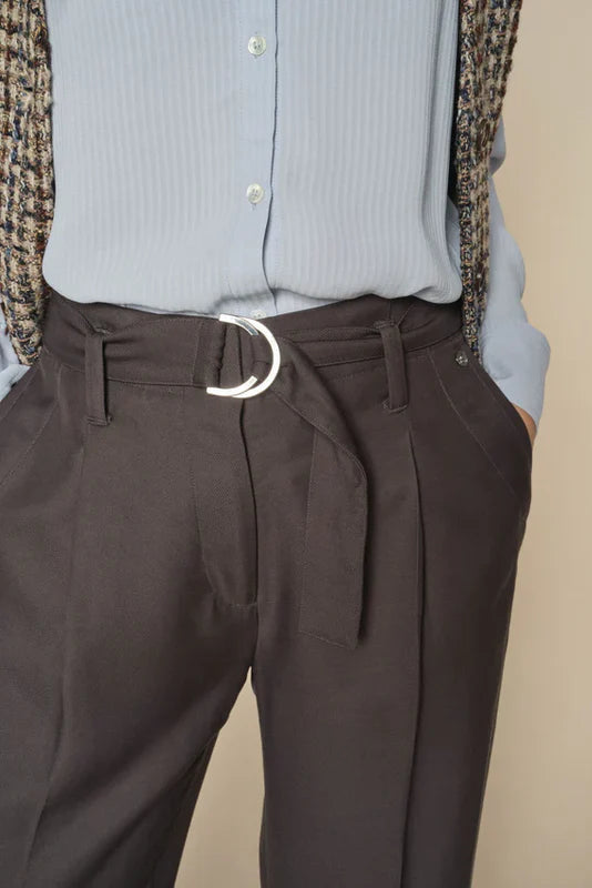Wide leg black look trouser with front pleats and belt with silver buckle. 