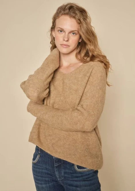 V Neck long sleeve sweater in tan with over size fit and rib detail. 