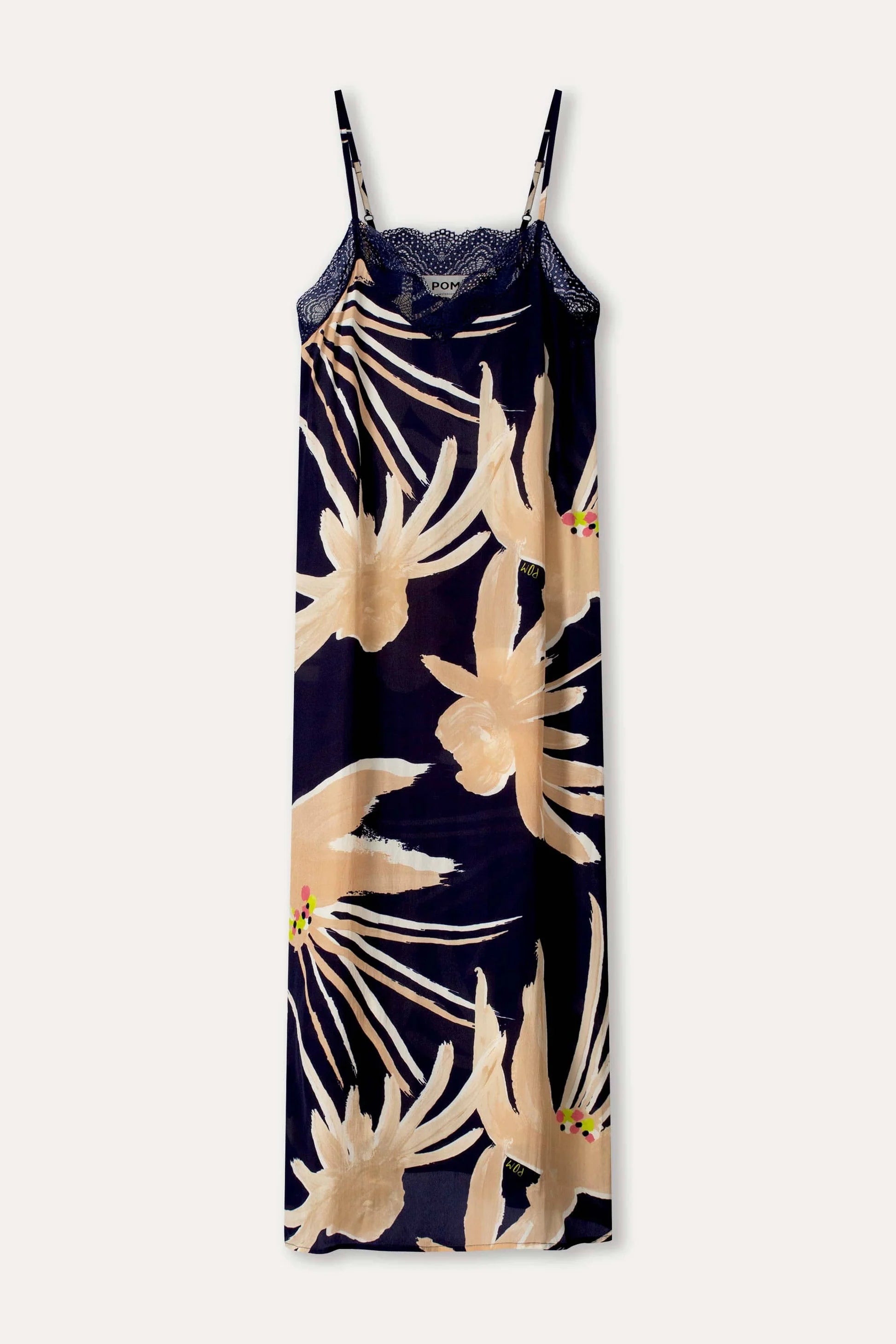Navy cami dress with beige floral pattern on a white background
