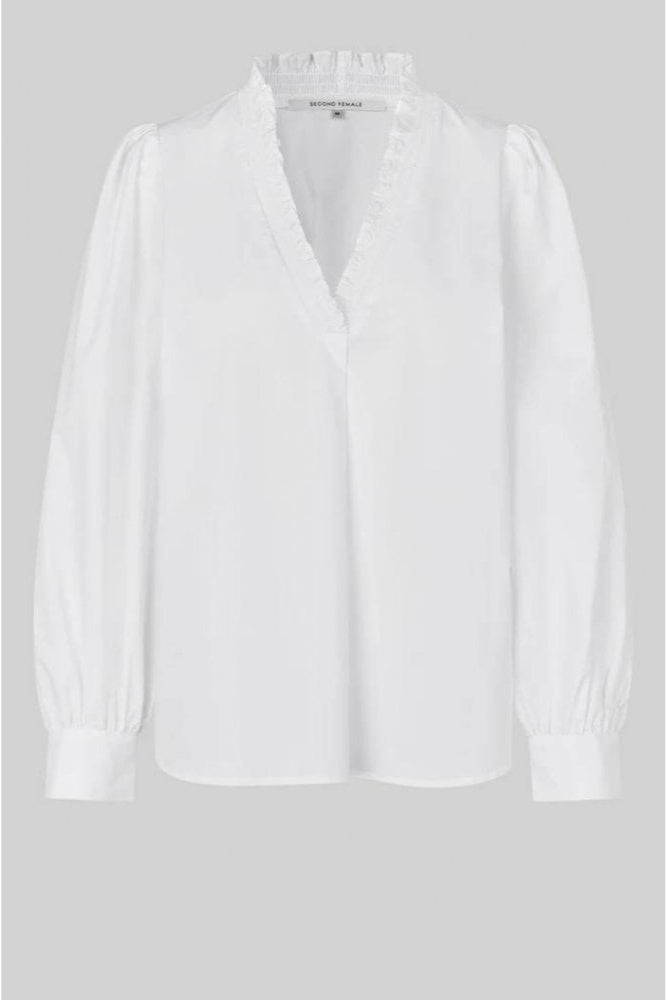 White long sleeve blouse with v neckline and frill detail. 