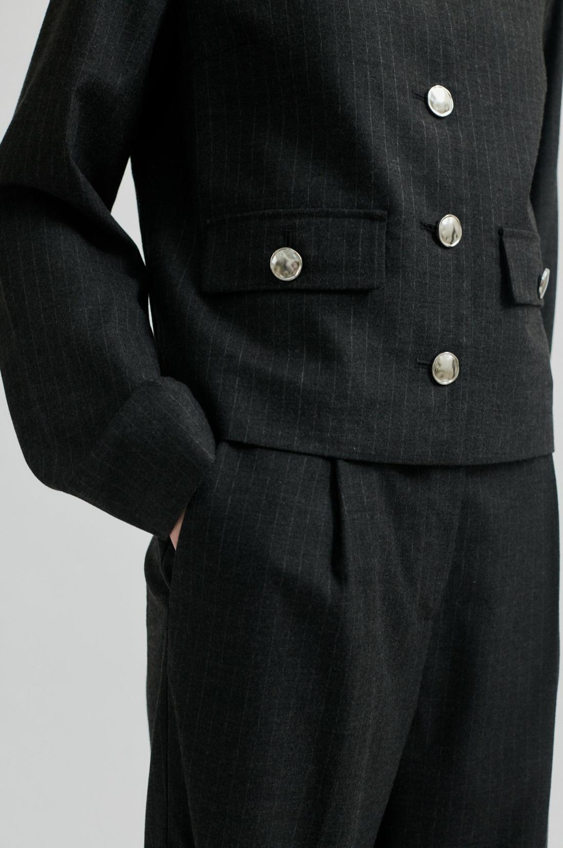 Mid Rise Straight leg pin stripe suit pant in dark grey melange.  Close up pleats at front and pockets. 