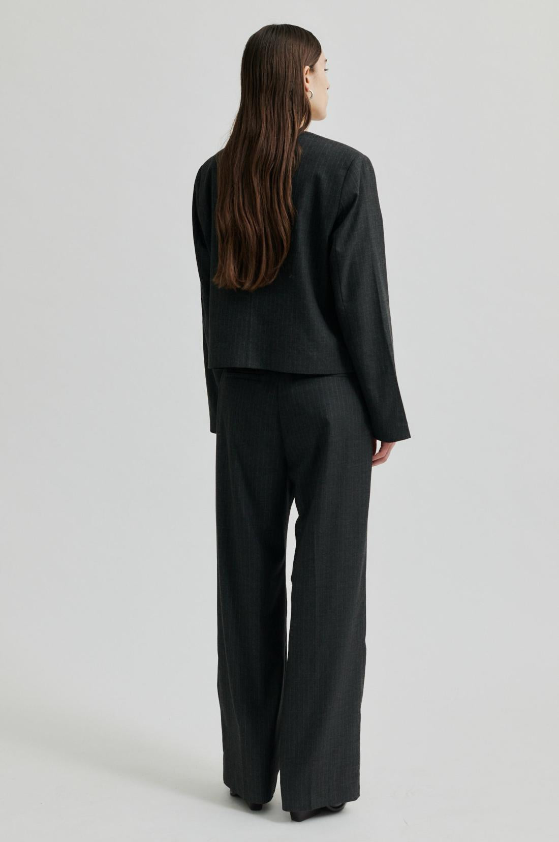 Mid Rise Straight leg pin stripe suit pant in dark grey melange. 