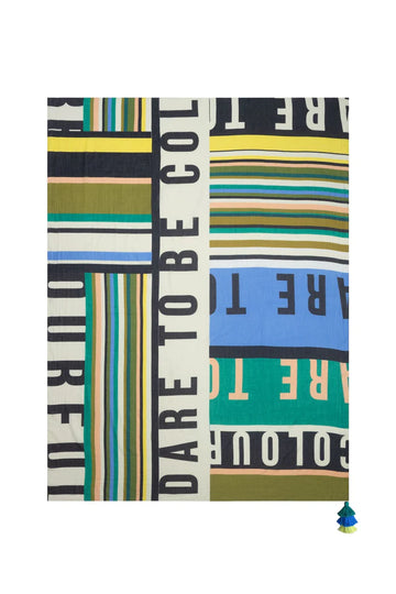 rectangular scarf has a stripey pattern in pastel shades. The scarf is printed with the quote: 'Dare To Be Colourful'